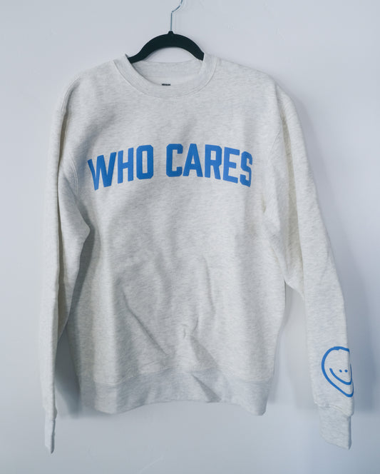 WHO CARES SMILEY CREWNECK